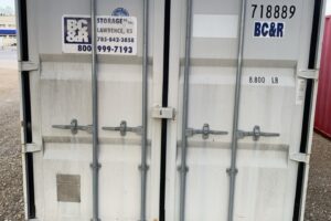 4013187dda | 40' shipping container (with contents)